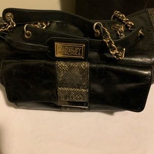 Black and gold Bradgley mischka purse